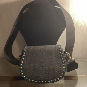 Elegant Black Crossbody Bag with Turquoise Details